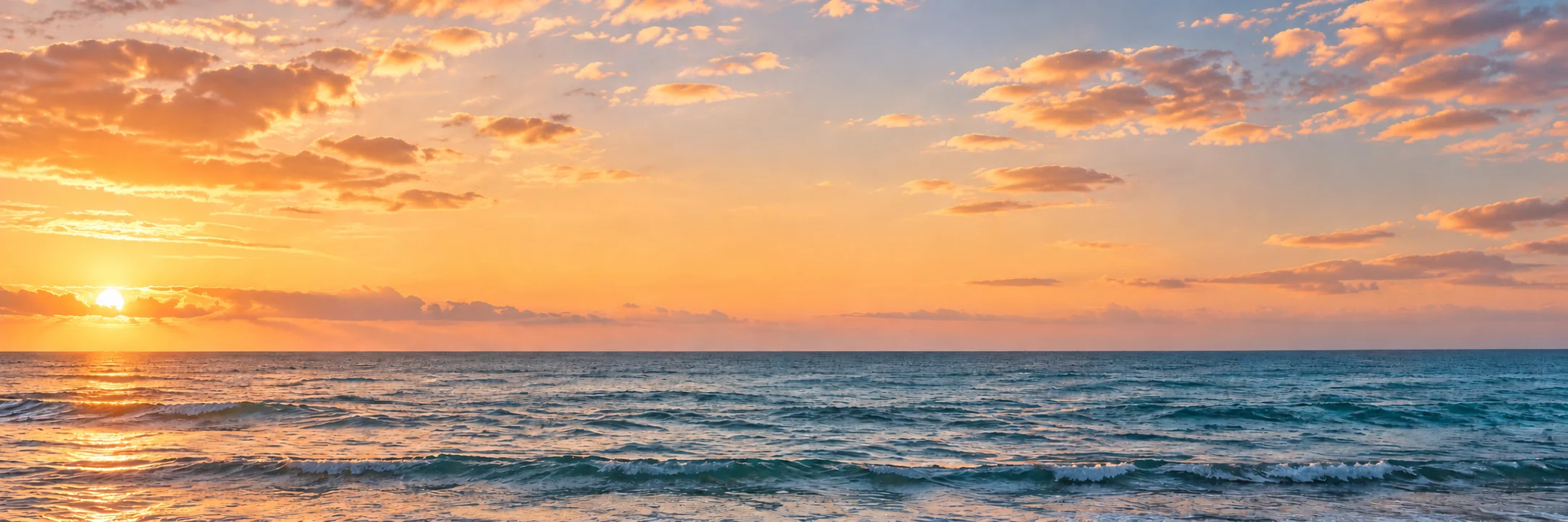 Golden sunset over the open ocean in Hawaiʻi